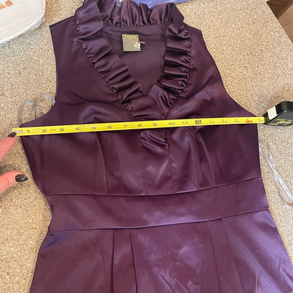 Purple, sleeveless dress. Gently used, size 8. Gorgeous.
